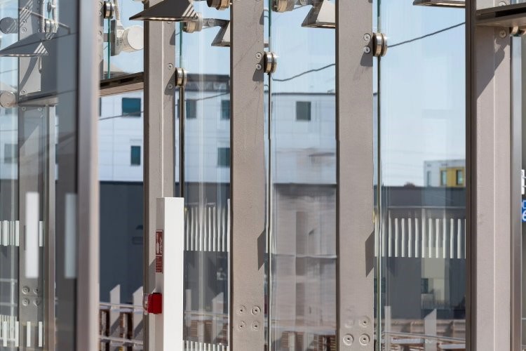 Train station Atrium Box Glazed Facade Platform and Canopies  | Architecturally Exposed Steel